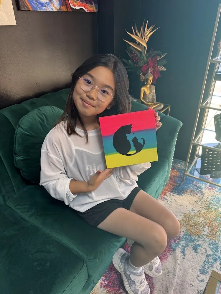 Kids creating canvas and resin art at summer camp in Johns Creek