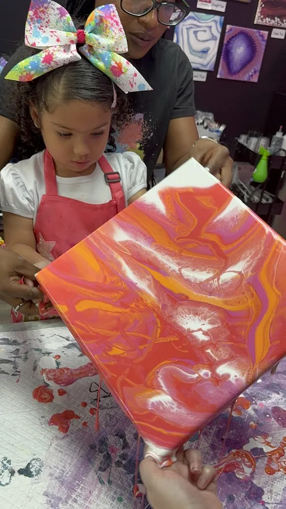 Kids enjoying a Friday night out at our Johns Creek art studio