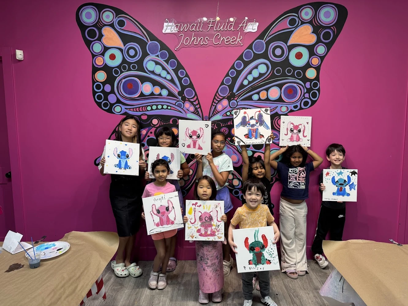 Little Explorers ages 4-6 guided canvas brush painting after school art class in Johns Creek