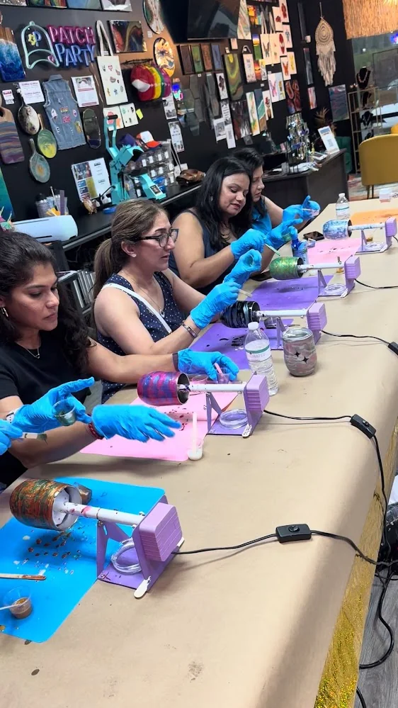 Kitty party guests creating custom resin tumblers and glass cups in Johns Creek studio