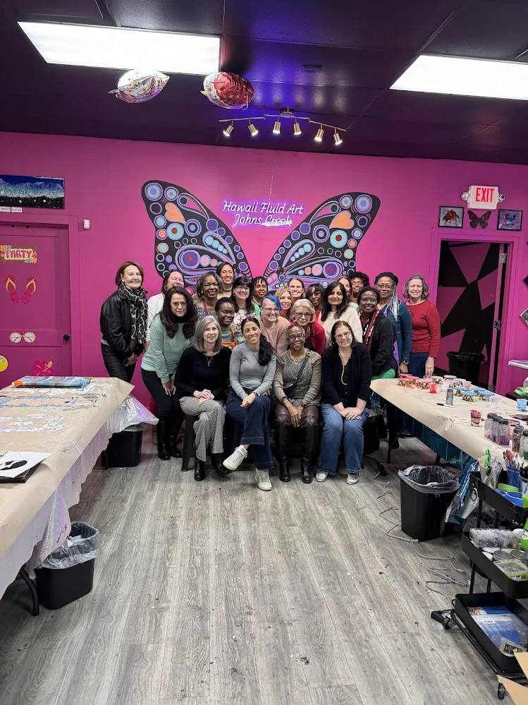 Large group of women celebrating a fun-filled kitty party art event at Hawaii Fluid Art studio